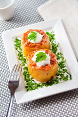 Zucchini stuffed with meat and vegetables