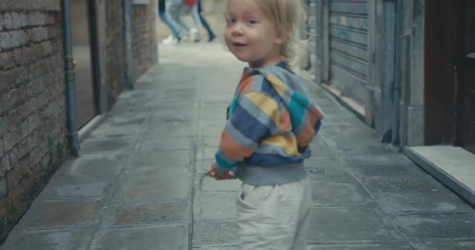 Little toddler in the street