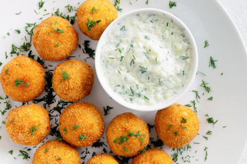 lentil croquettes with cacik sauce decorated with dill
