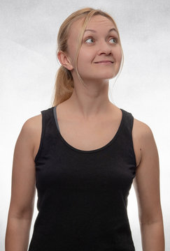 Young Woman In Black Tank Top Looking Right