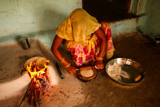 Traditional Way Of Making Food Cooking On Open Fire In A Rural Village,near Kajiraho,India