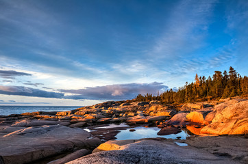 Dawn on the rocks, St-Lawrence river, Quebec, Canada