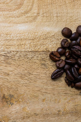 coffee bean pile on a  wooden background