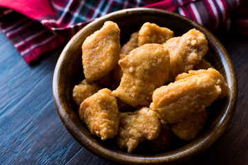 Boneless Chicken Wings in Wooden Bowl / Nuggets