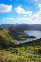 Amazing lagoon surrounded by mountains. ancient crater of a volcano. Fire Lagoon Azores island Portugal