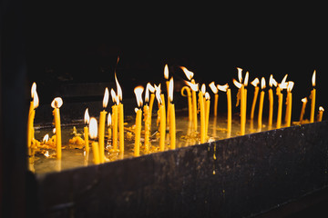 burnt candles in the church