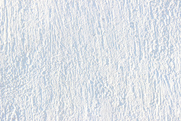 White textured stucco wall detail close up backdrop