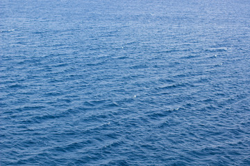 south sea water surface and waves background texture vacation concept shot for banner or card, copy space