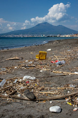 Plastic waste and rubbish on the beach in castellammare di stabia Italy. Bay of Naples