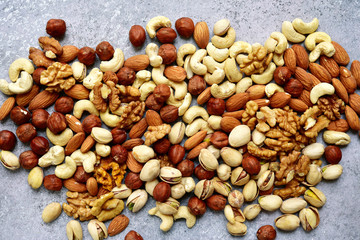 Assortment of nuts - healthy snack.Top view with copy space.