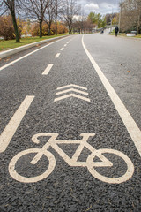 street sign Bicycle painted on a dedicated track path for sports and Cycling in city parks