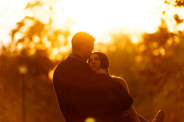 Boyfriend and girlfreind holding each other in their hands and feeling special.