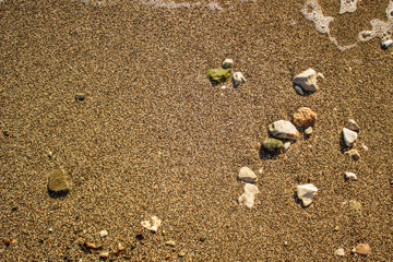 sea sand and stones background texture vacation concept with empty copy space