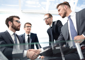 bottom view.a handshake is serious business partners