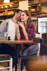 cute young couple  in cafe