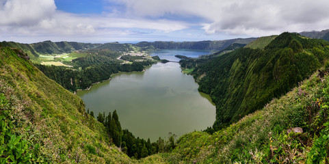 The huge Caldeira Sete Cidades with green and blue crater lake is a landmark of Sao Miguel, panoramic shot - Location: Portugal, Azores, Sao Miguel Island, Sete Cidades with Lagoa Azul and Lagoa Verde