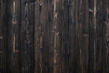Dark brown wood texture with natural striped pattern background