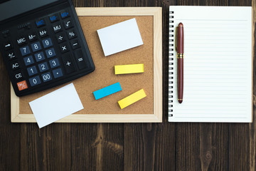 ffice supplies or office work essential tools or items on wooden desk in workplace, top view with copy space for add text.