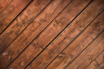 Spit lines rustic wooden texture background. Facade of a log house, copy space. Wooden texture background Wall of blockhouse