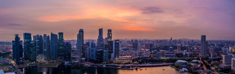 Naklejka na ściany i meble Singapore skyline at sunset