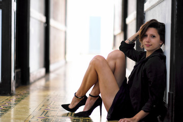 Fototapeta premium Model sitting in the floor