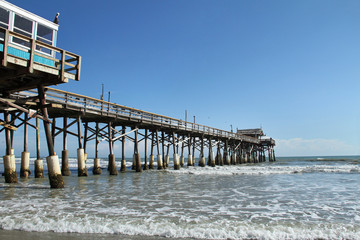 Cocoa Beach Pier, Florida and Pelican