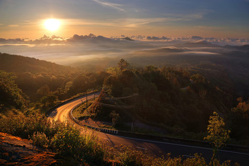 Fototapeta na wymiar Beautiful scenery during sunrise time of Doi Tigers Head view point at Doi Inthanon National park,Chiang Mai,Thailand is a very popular for photographers and tourists. Attractions and natural Concept