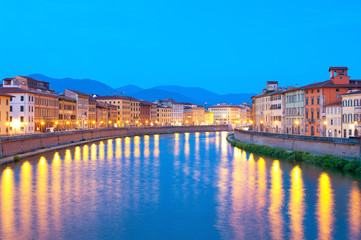Fototapeta na wymiar River Arno at night Pisa Italy
