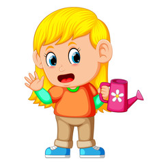 A girl holding a watering can
