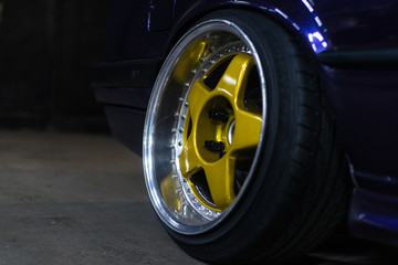 Legendary alloy two-piece sport rims on beautiful wheels in polished and gold color