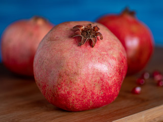 Fototapeta na wymiar Delicious Pomegranate On The Table