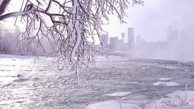 Walking along Niagara river towards frozen falls.
