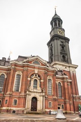 Fototapeta na wymiar Saint Michael Church in Hamburg in a cold rainy day of early spring