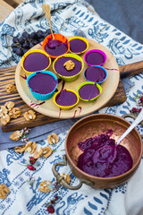 Pelamushi - Gerogian traditional sweet dessert. Cooked porridge with condensed grape juice, corn and white flour, walnuts. Also called tatara in silicone pie tin. 