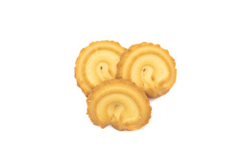top view of three butter cookies on white background