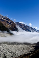 Clouds touching the No. 1 Glacier in Hailuogou, Sichuan, China.  