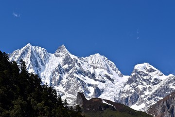 Fototapeta na wymiar Mountains around Mt. Gongga, all of them above 5000m. Sichuan, China. 