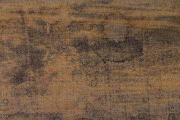 Old stains and stains from paints on canvas.