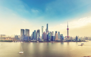 Fototapeta na wymiar Aerial panorama view on Shanghai, China. Beautiful daytime skyline with skyscrapers and the Huanpu river.