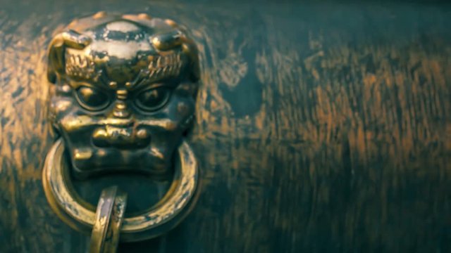 Chinese design elements: Gold plated animal face Statue in the Forbidden City, 
Beijing, China.Symbol of Chinese traditional culture.