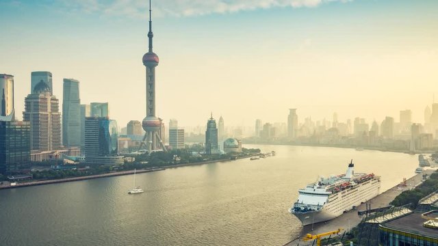 Aerial view on Shanghai, China. Beautiful daytime skyline with skyscrapers and the Hnanpu river 4k timelapse.