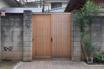 sidewalk by street wall & door