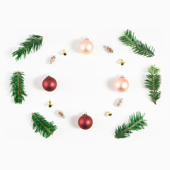 Festive composition of Christmas decorations on white background.
