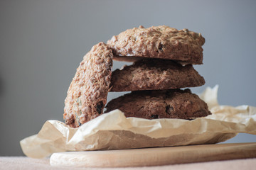 Oat cookies with raisins. Homemade food. Grey background