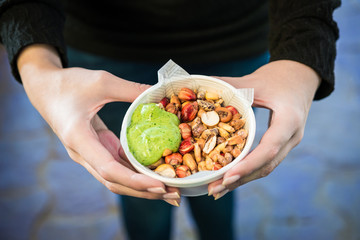 Different kinds of fried Andean corn maize with chilli sauce, a traditional Peruvian snack at a street food market fair festival 