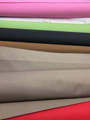 Rolls of colorful fabrics