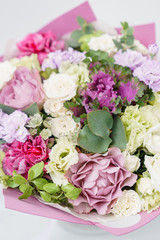 Beautiful spring bouquet . Arrangement with various flowers. The concept of a flower shop. A set of photos for a site or catalogue. Work florist.