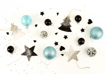 Christmas composition background from black and blue Christmas decorations on white background.  Xmas  of New Year's Christmas balls. Creative Winter holiday concept.Flat lay. Top view. Copy space
