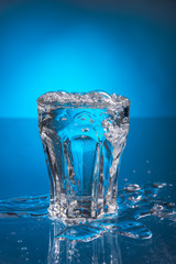 glass with clear water in the studio