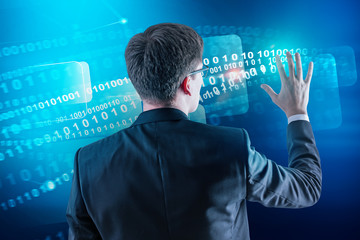 Man in glasses using binary numbers interface